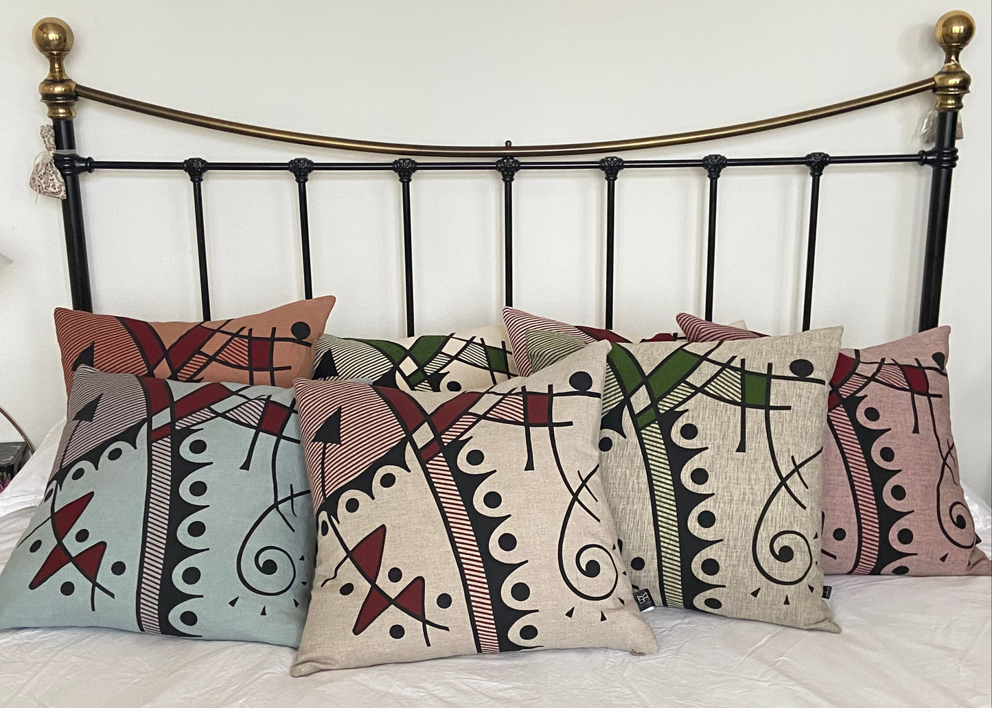 Jazz cushion cover in rust-red on natural