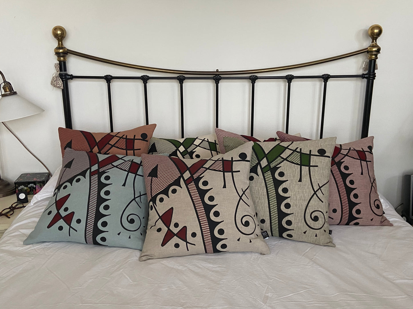 Jazz cushion cover in deep red on chalk blue