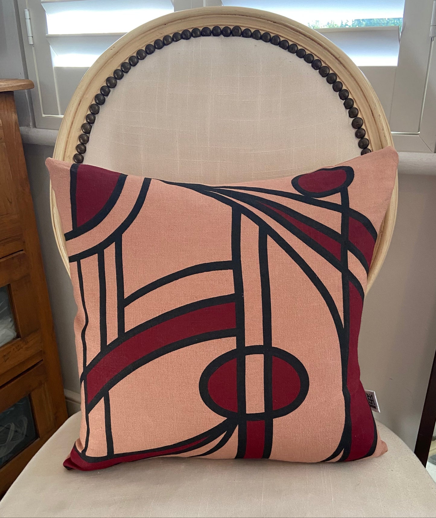 Bloom cushion cover in burgundy on dusty rose