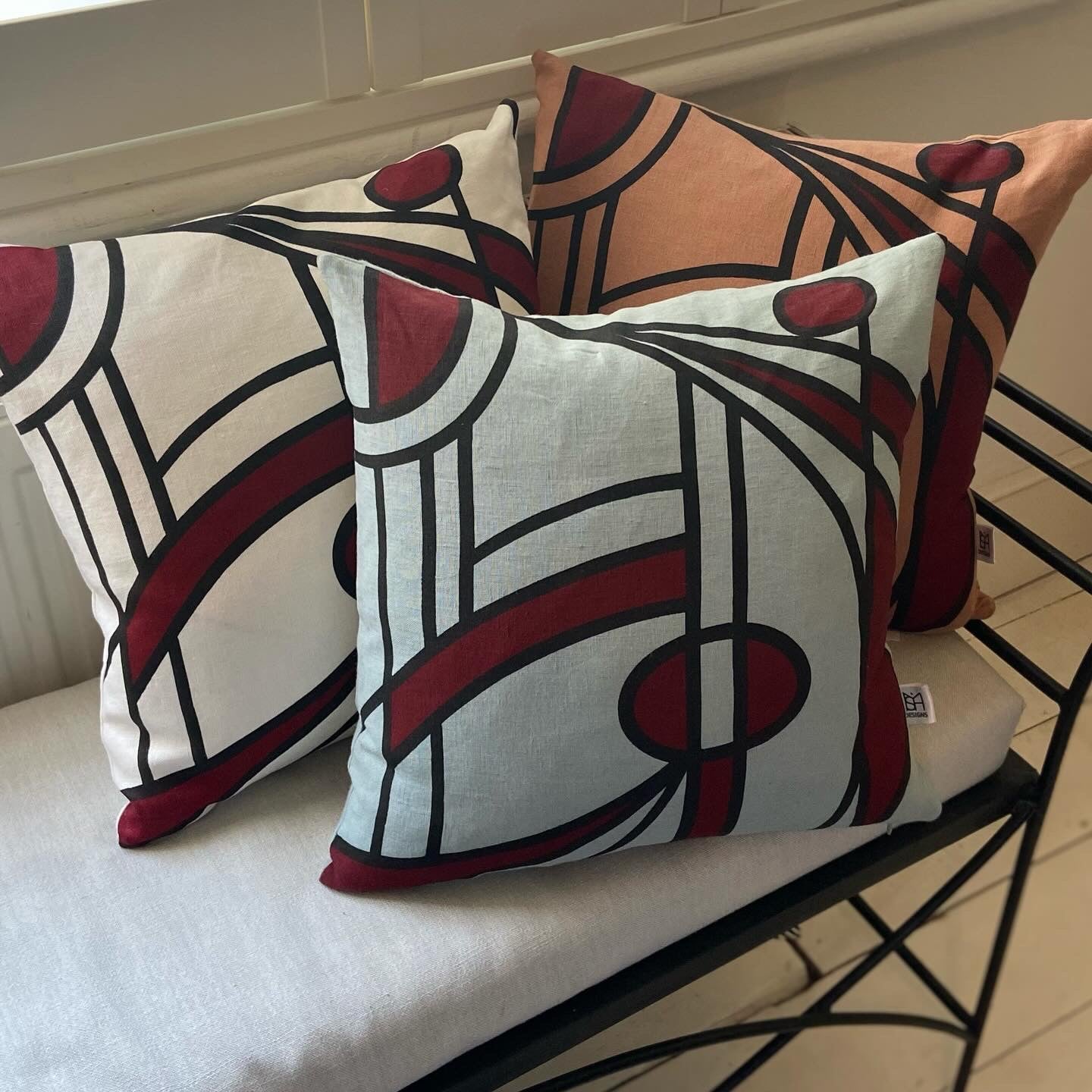 Bloom cushion cover in burgundy on dusty rose